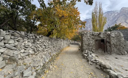 Traditional stone houses and autumn trees in Khaplu village along Thallay La Pass trekking route Gilgit-Baltistan